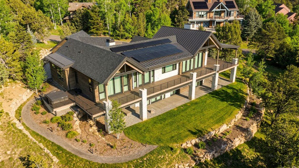 Drone photo of a colorado home after AI transformed it into summer
